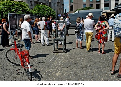 KRAKÓW, POLAND - July 2022. Holocaust Memorial - Ghetto Heroes Square. Art Installation From 2005  - Cast-iron Chairs Reminding Us Of What Was Left After The Liquidation Of The Krakow Ghetto.