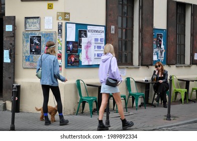 KRAKÓW, POLAND - June 12, 2021. Tourists in the vibrant, history-filled Kazimierz district of Krakow (also known as the Jewish Quarter). 