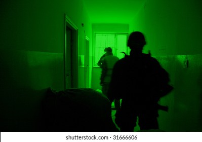 POLAND - MARCH 28: View Through The Night Vision Device During A Soldiers Training (battle Camp) To Conduct An Attack Inside A Building At Night March 28, 2008 In Poland.