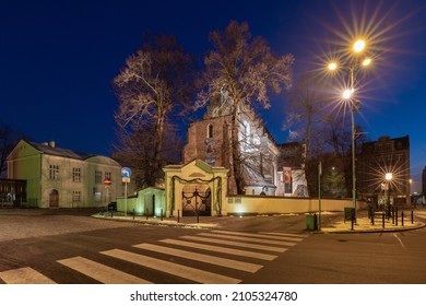 Poland, Poznan - January 9, 2022: Facade Of An Old Church In The Early Christmas Morning.