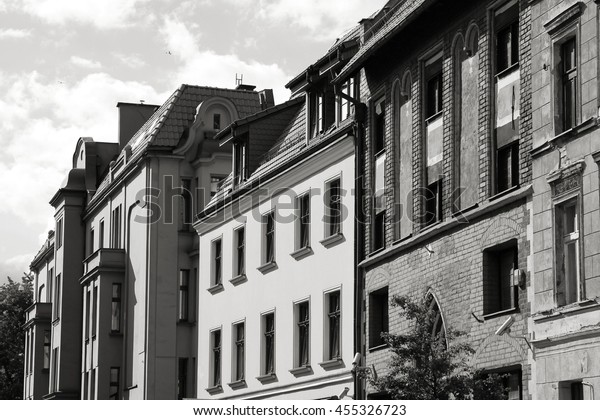 Poland - Torun, city divided by Vistula river\
between Pomerania and Kuyavia regions. Old Town buildings. The\
medieval old town is a UNESCO World Heritage Site. Black and white\
retro style.