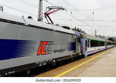 Poland, Warsaw, July 2021. Close-up Of The Polish State Railways Long-distance Train Intercity On The Platform. No People.