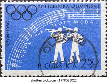 POLAND-CIRCA 1960 : A post stamp printed in Poland showing Olympic rings. Olympic Games - Rome, Italy. Fanfare blowers 