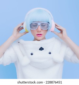 Polar Bear  Girl DJ On A Blue Background. ?razy Party. Club Dance Style