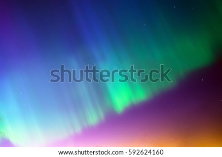 Polar northen Lights aurora borealis. Sky night stars