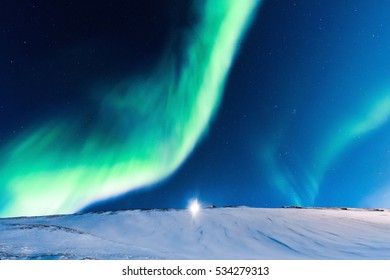 The Polar Northern  Lights In Norway Svalbard In The Mountains