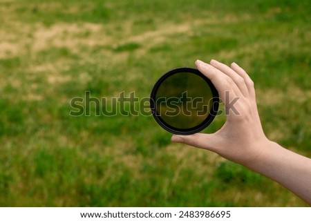 Polarizing UV protection filter for camera lenses