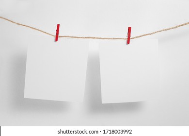 Polaroid Frame.Retro Photo Frames Hanging On Rope Isolated On White Background. Real Photo.