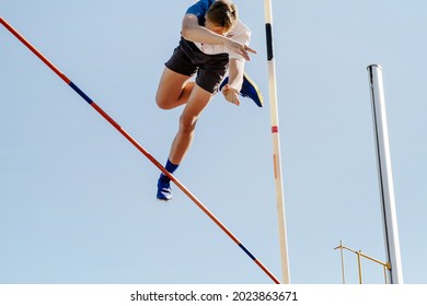 Pole Vault Male Jumper On Blue Sky Background