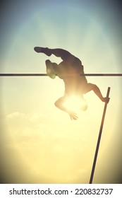 Pole Vault Over The Bar With  Back Light. Vintage Version