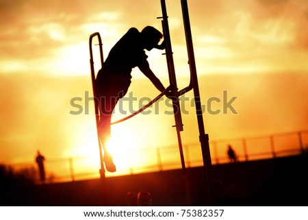Pole vaulter at sunset
