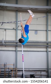 Pole Vaulting Indoors Young Man Jumping Stock Photo (Edit Now) 1554206141