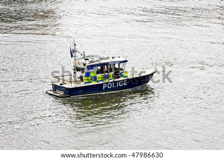 Police boat at river Thames for emergency response