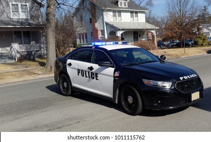 Police Car Barricade On Residential Neighborhood Street.