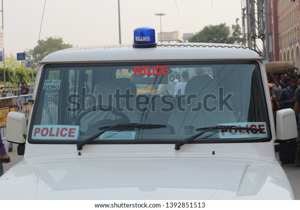 Police car in\
Calcutta, India, March 26,\
2019.