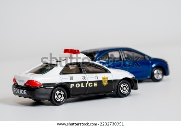 A police car\
chasing a suspicious vehicle.