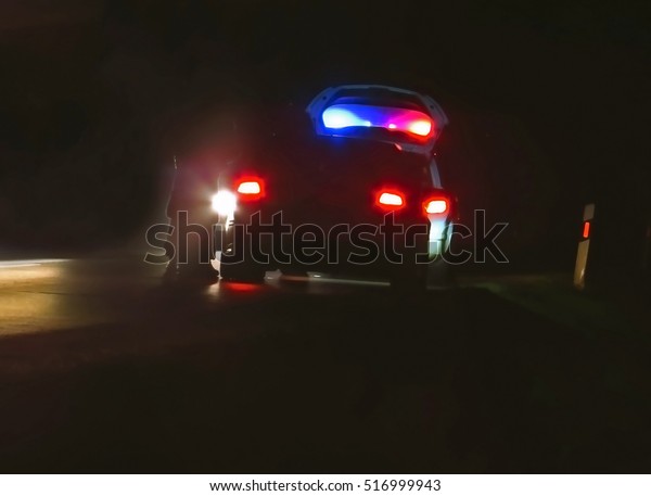 police\
car, cop pursuit in night blue red light      \
