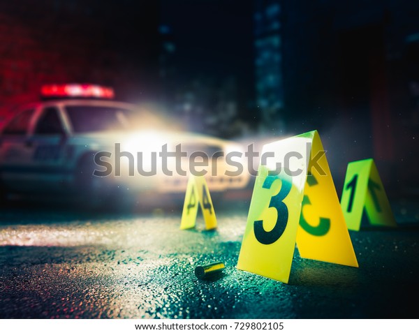 police car at a crime scene with evidence markers /\
high contrast image