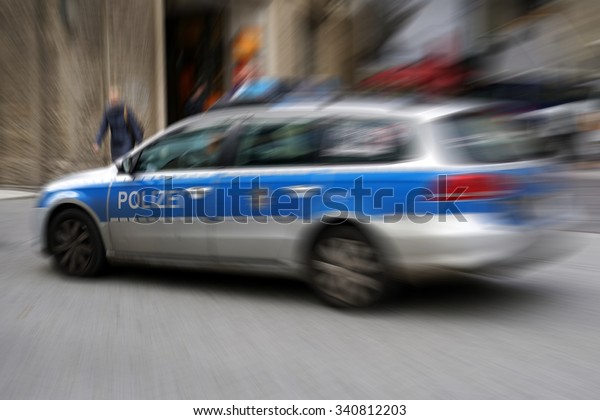  police car during a police operation\
in the center of Cologne                         \
