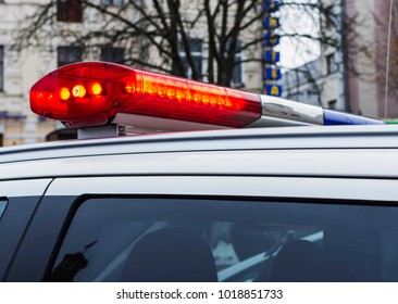 Police Car Lights In Day Time. Patrolling The City, Crime Scene.Selective Focus.