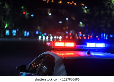 Police Car At Night In Street