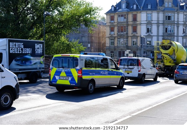 police car on streets of germany, law enforcement\
officers guarding order on vehicles, patrolling, sending law\
enforcement officers to incident or crime, investigating crimes,\
Frankfurt - July 2022
