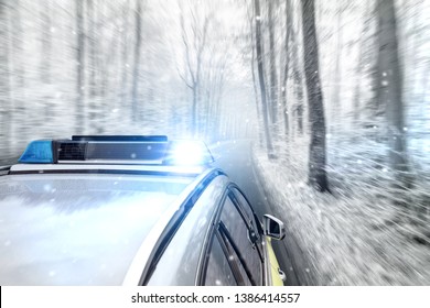 Police Car On A Winter Street In A Forest.