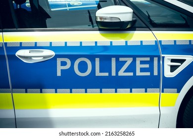 A Police Car From The Side With The German Text Police