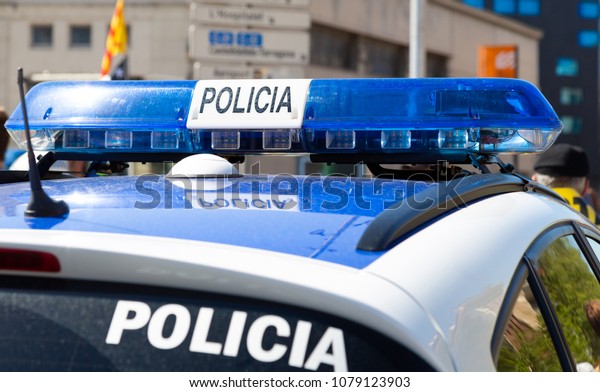 Police car with siren and\
call sign