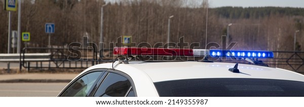 A police car with special signals on the\
car.Criminal news.