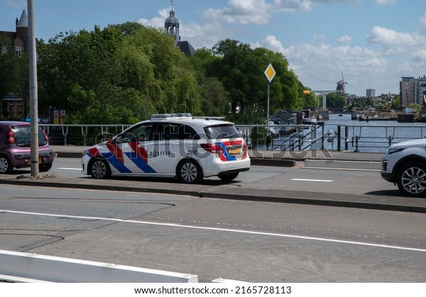 Police Car Standing Still At Amsterdam The\
Netherlands 9-6-2022