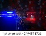 Police cars at night. Police car chasing a car at night with fog background. 911 Emergency response police