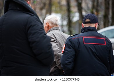 The Police Detained The Offender, A Light Offense, Resistance To Arrest, Handcuffed, Compliance With The Law, Waiting For The Court, Law Enforcement In The City, The Culprit Of The Accident