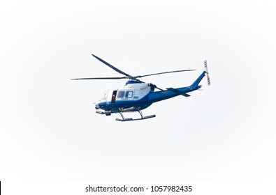 Police Helicopter Flying in the sky on a white background for design as a security concept and surveillance