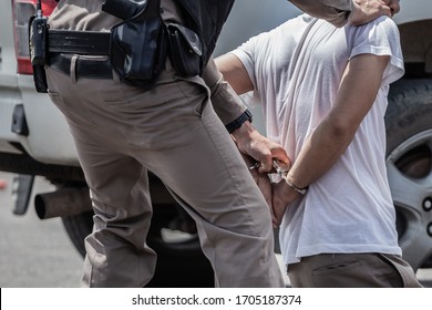 police helped to catch the guilty and lock the handcuffs,arrested.