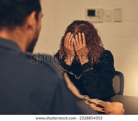 Police, investigation and detective listening to woman for crime interrogation or criminal arrest. Law, crime and man at station for corruption interview, questions in money laundering and handcuffs.