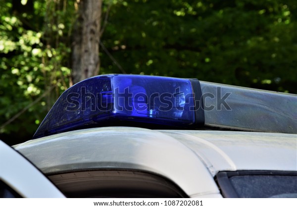 \
police lamps on a patrol\
car
