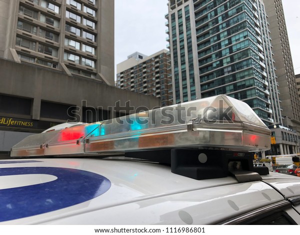 POLICE LIGHTS, EMERGENCY ON STREET - TORONTO, CANADA
- May 2, 2018