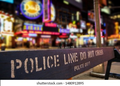 Police Line Crime Scene In New York City With Blurry Background Night Time