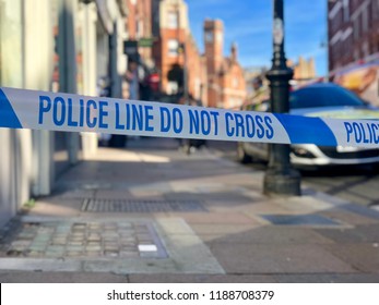 Police Line Do Not Cross Crime Scene Perimeter Cordon Tape In A London Street