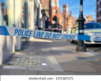 Police Line Do Not Cross Crime Scene Perimeter Cordon Tape In A London Street