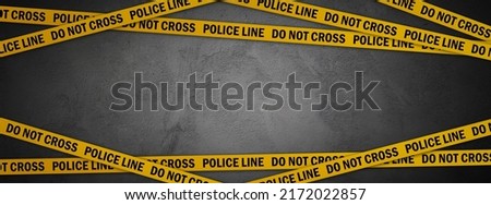 Police line do not cross on dark concrete wall background. Crime scene banner with copy space for true crime stories or investigations podcast.	