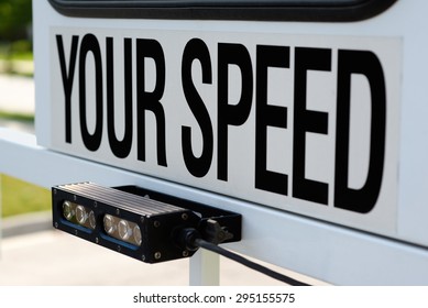 Police Mobile Radar Speed Sign. Picture of a mobile police radar trailer with a sign that says Your Speed