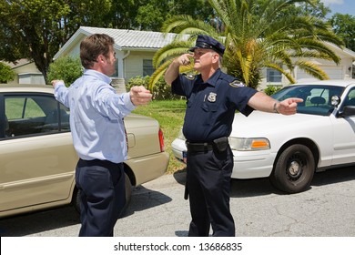 Police Officer Demonstrating A Field Sobriety Test To A Motorist.