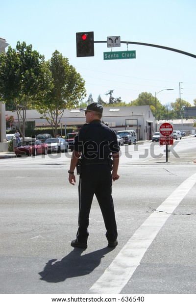 Police Officer Directing\
Traffic