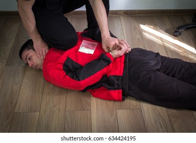 A Police Officer Finds Drugs During The Search Of Drug Dealers