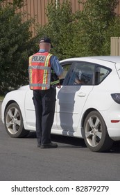 Police Officer Issuing Speeding Ticket
