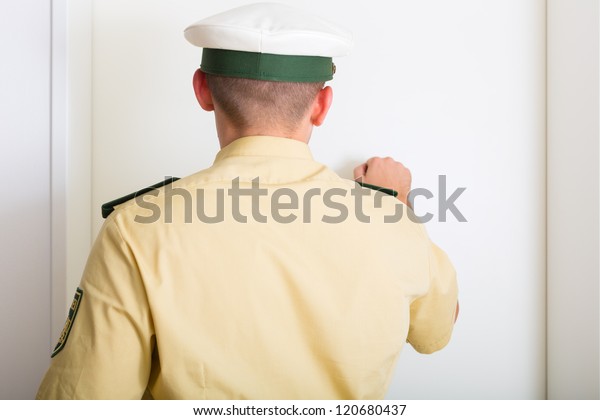 Police Officer Knocking On Front Door Stock Photo Edit Now