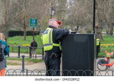 Police Officer Makes Notes At The Start Of The Anti Lockdown Protest In London, UK. 20.03.21