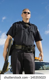 Police Officer With Shotgun